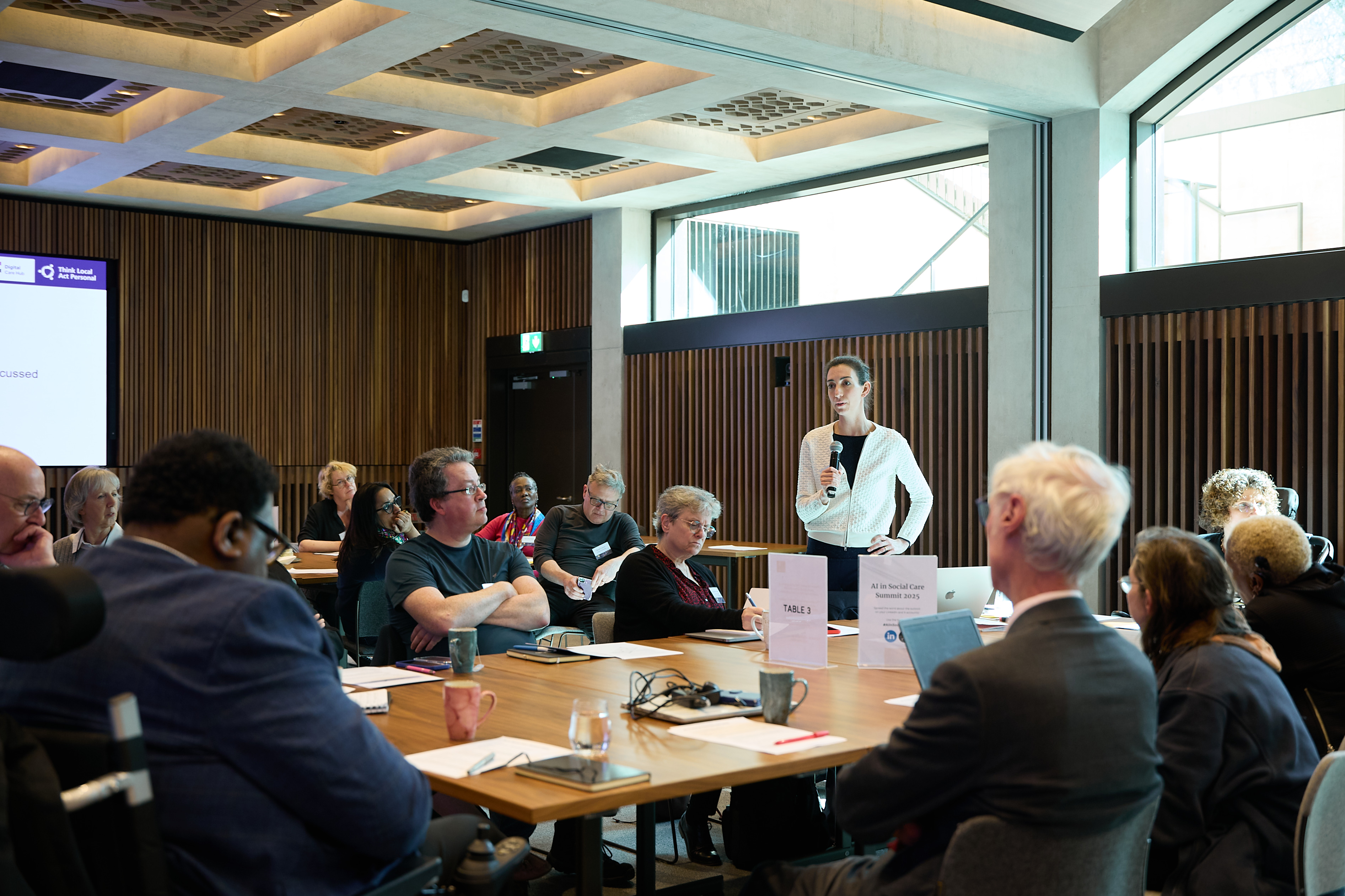 Dr Caroline Green speaking at the Collaborative Workshop on day one of the AI in Social CAare Summit